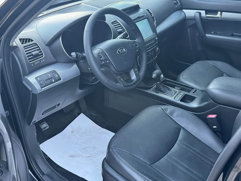 Kia Sorento — фото 8
