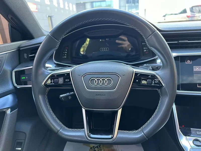 Audi A7L — фото 11