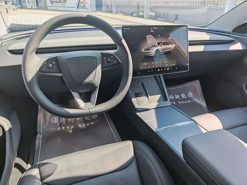 Tesla Model 3 — фото 18
