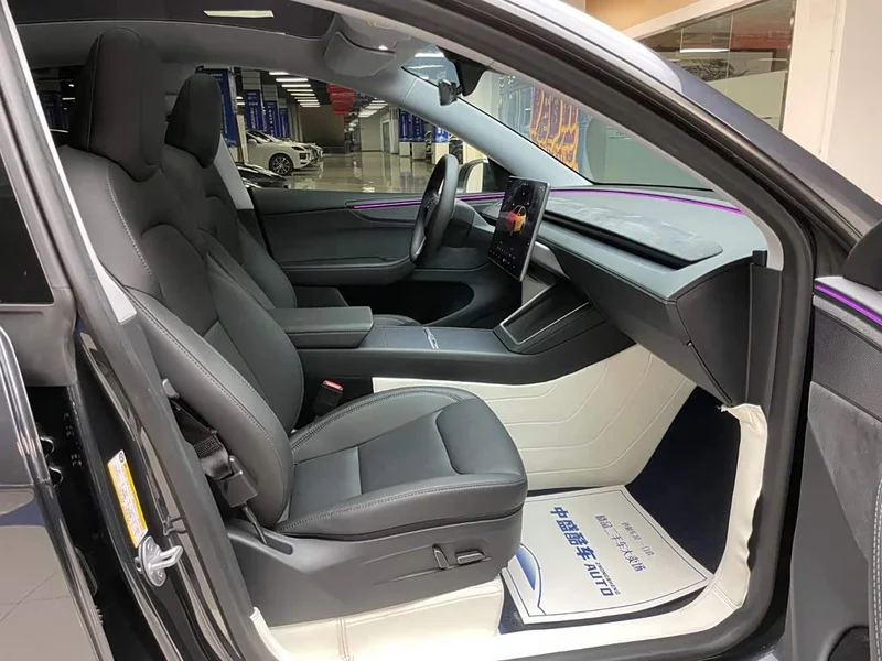 Tesla Model Y — фото 16
