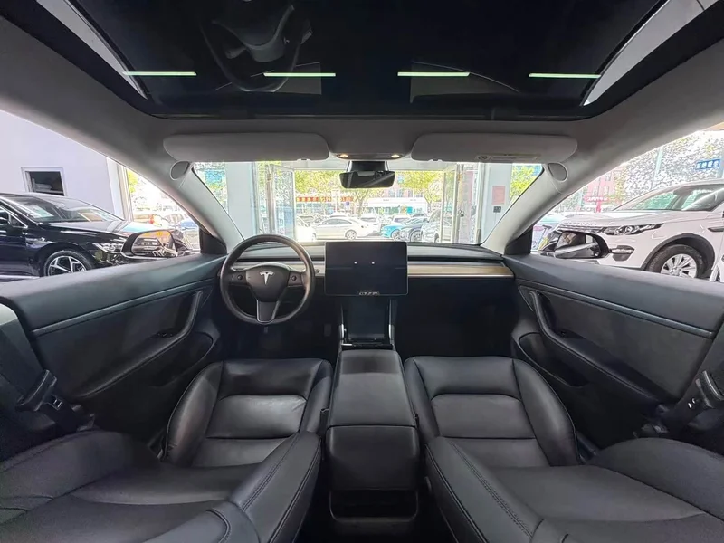 Tesla Model 3 — фото 9