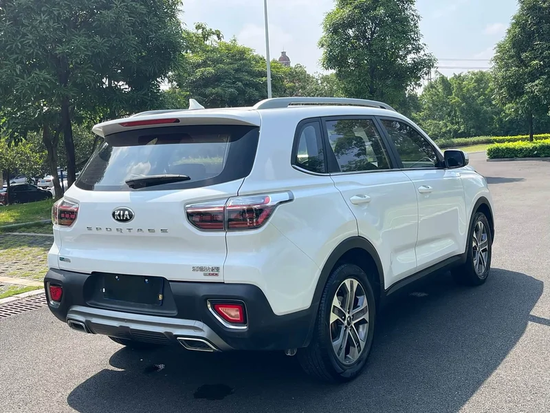 Kia Sportage — фото 7