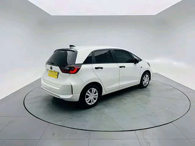 Honda Fit — фото 7