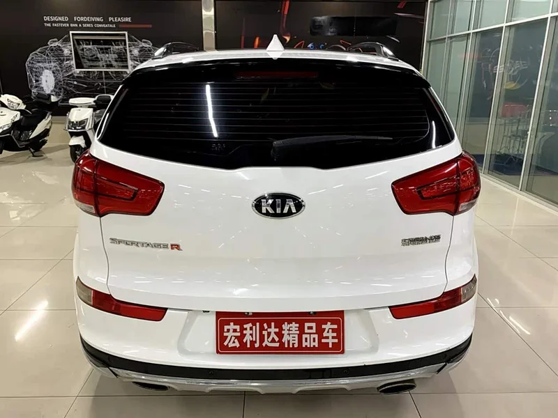 Kia Sportage — фото 11
