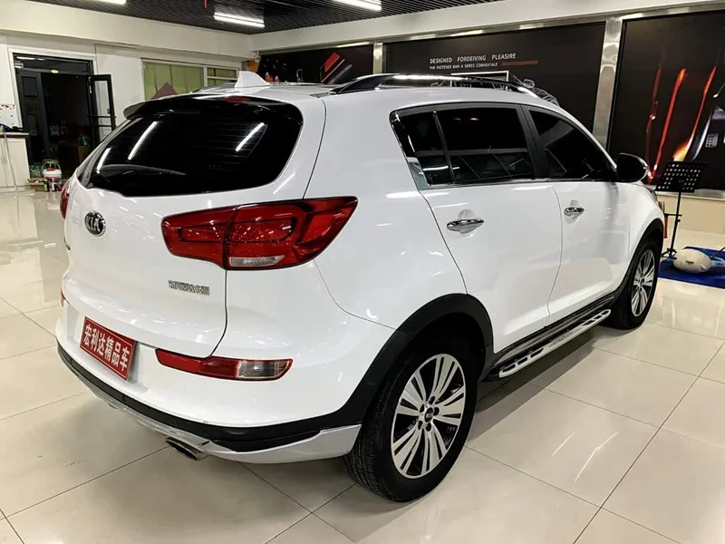 Kia Sportage — фото 12