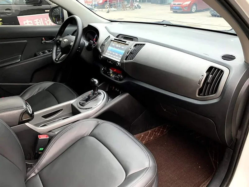 Kia Sportage — фото 13