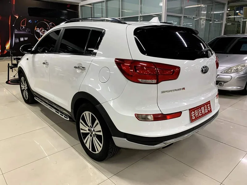 Kia Sportage — фото 16