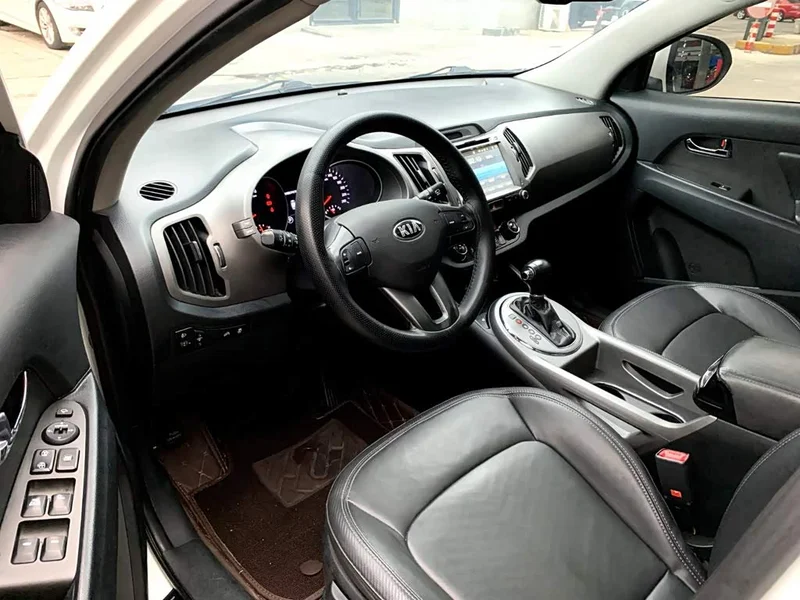 Kia Sportage — фото 5