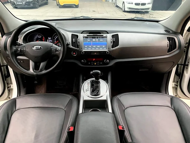 Kia Sportage — фото 6