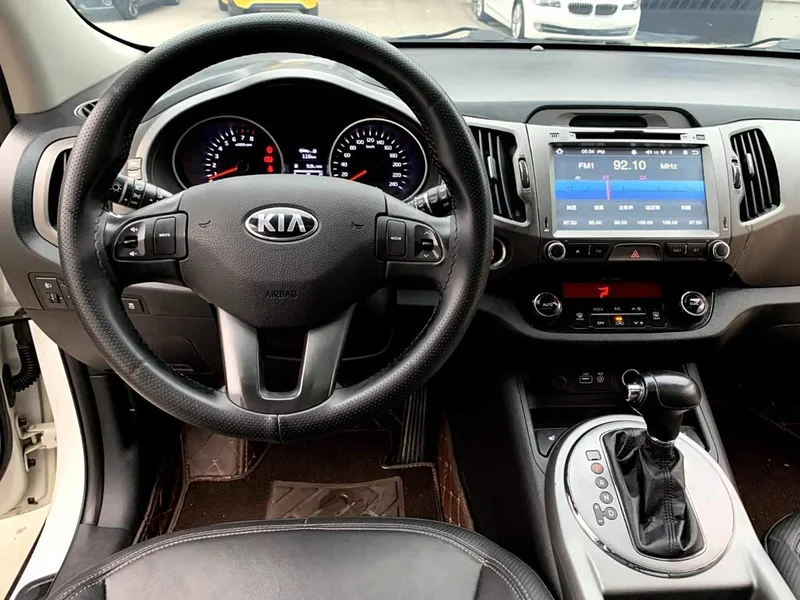 Kia Sportage — фото 7