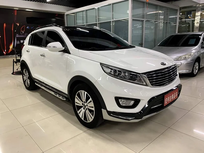 Kia Sportage — фото 9