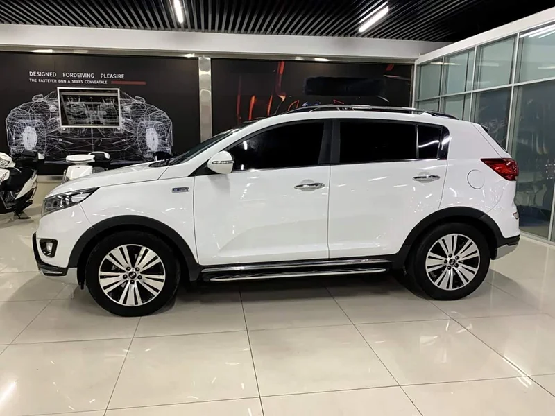 Kia Sportage — фото 10