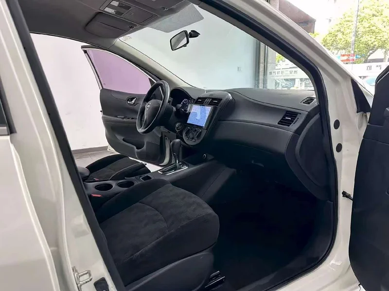 Nissan Tiida — фото 4