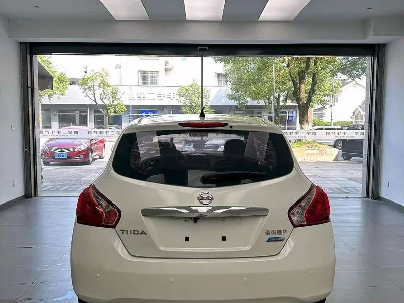 Nissan Tiida — фото 8
