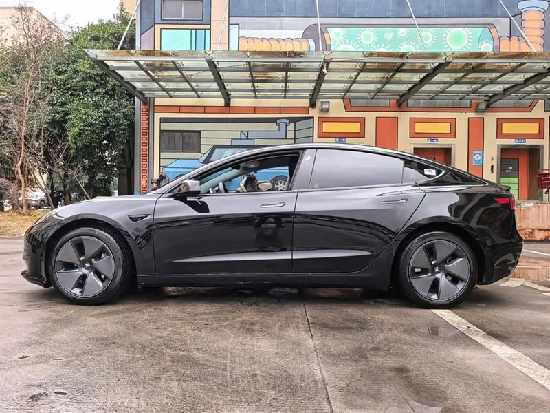 Tesla Model 3 — фото 14