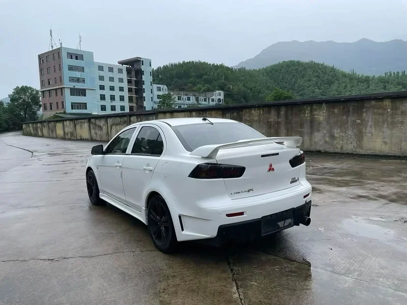Mitsubishi Lancer EX — фото 8