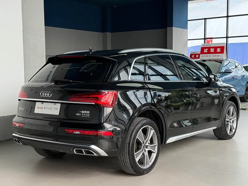 Audi Q5L — фото 5