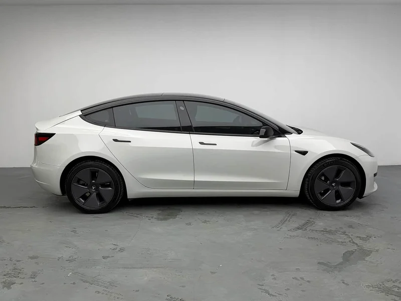 Tesla Model 3 — фото 19