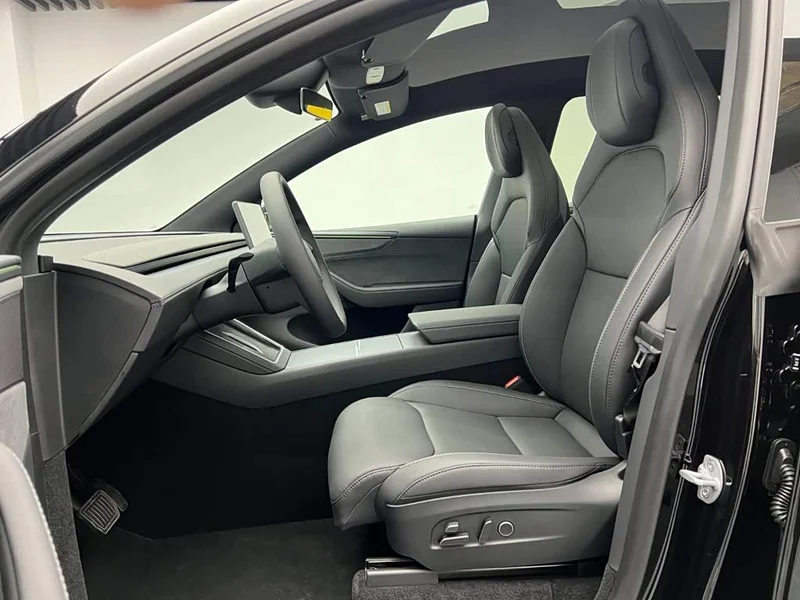 Tesla Model Y — фото 16