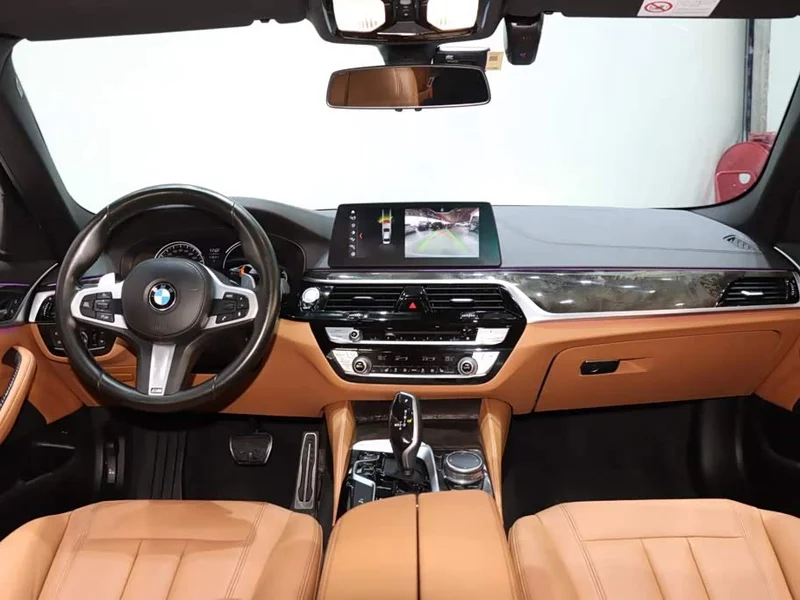 BMW 5-Series — фото 12