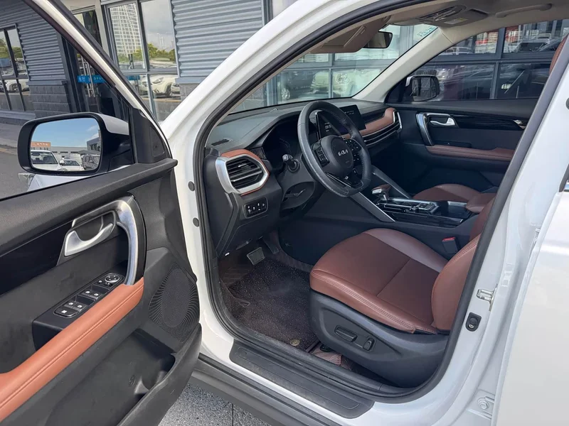Kia Sportage — фото 12