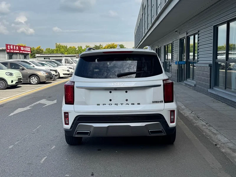 Kia Sportage — фото 14