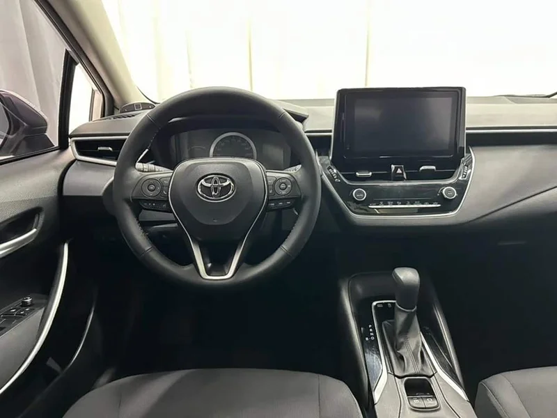Toyota Corolla — фото 14