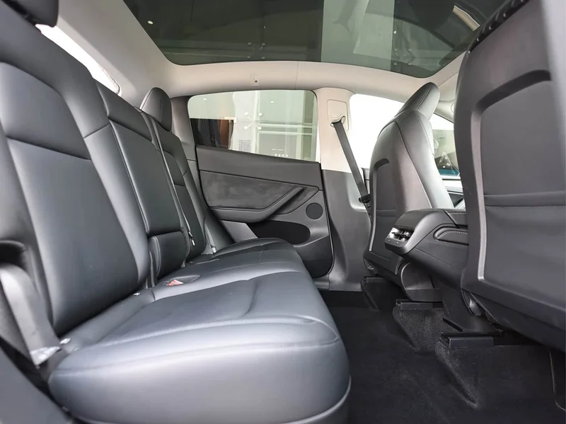 Tesla Model Y — фото 14