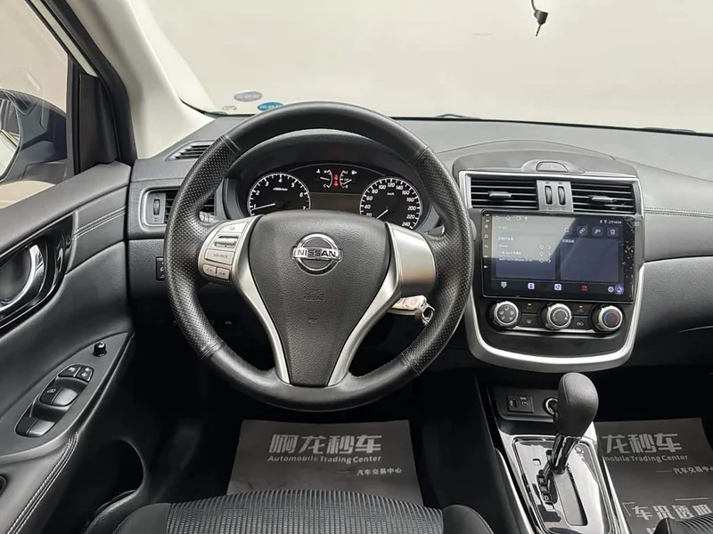 Nissan Tiida — фото 10