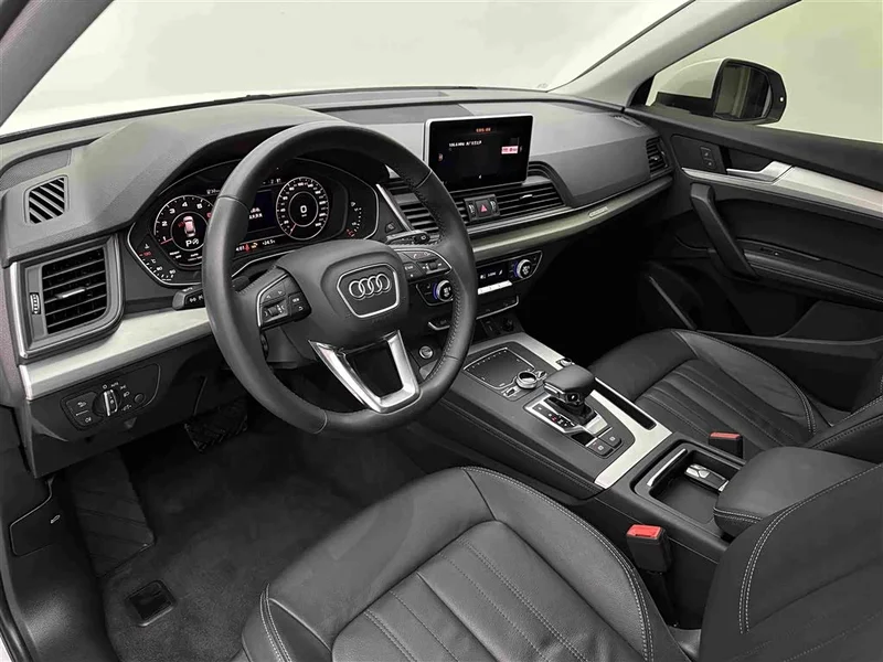 Audi Q5L — фото 16