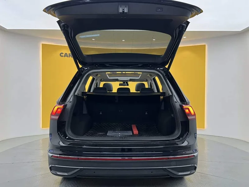 Volkswagen Tiguan L — фото 12