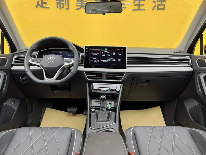 Volkswagen Tiguan L — фото 14