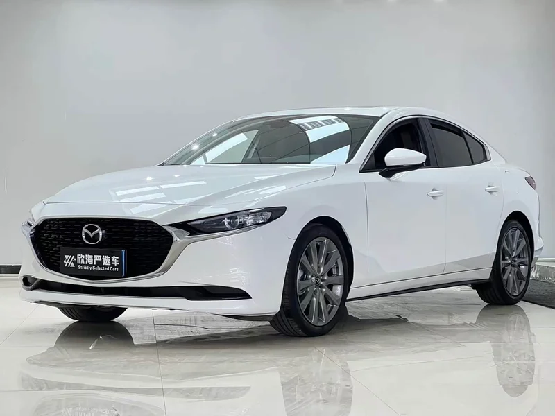 Mazda 3 Axela — фото 1