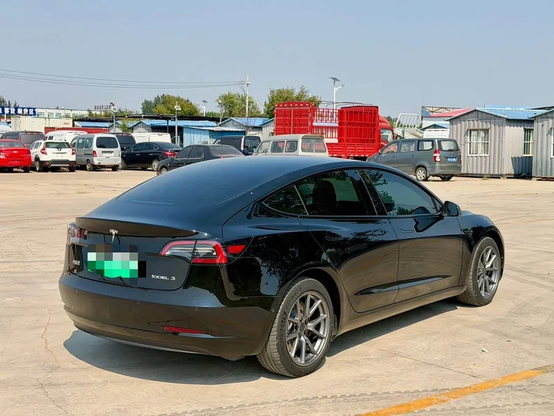 Tesla Model 3 — фото 9