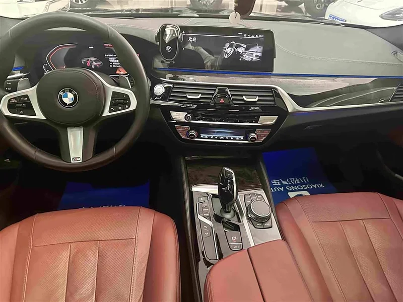 BMW 5-Series — фото 15