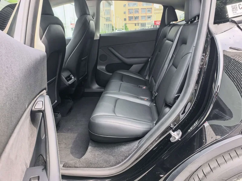 Tesla Model Y — фото 14