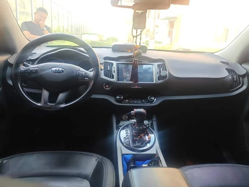 Kia Sportage — фото 12