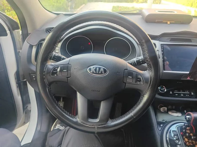Kia Sportage — фото 15