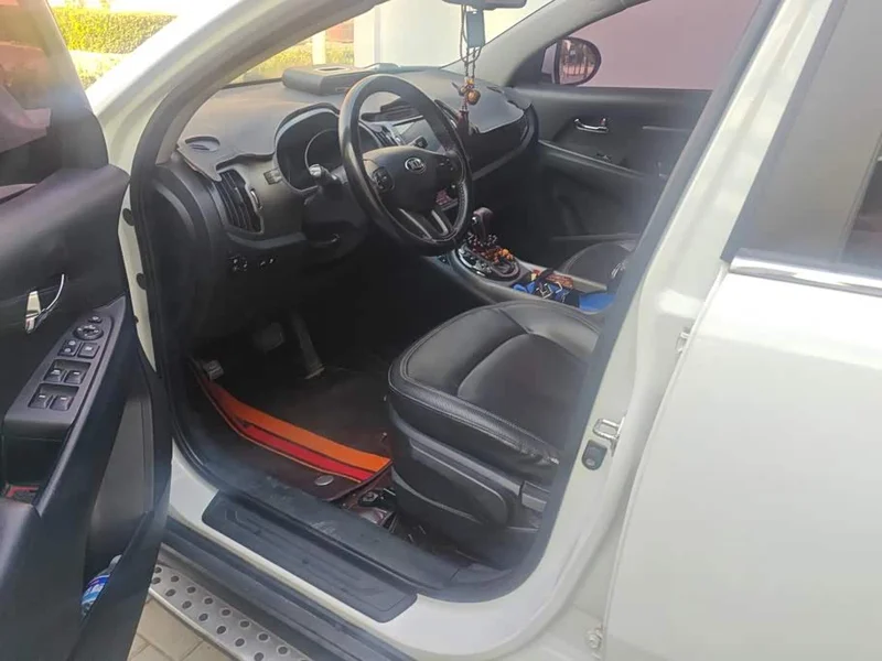 Kia Sportage — фото 9