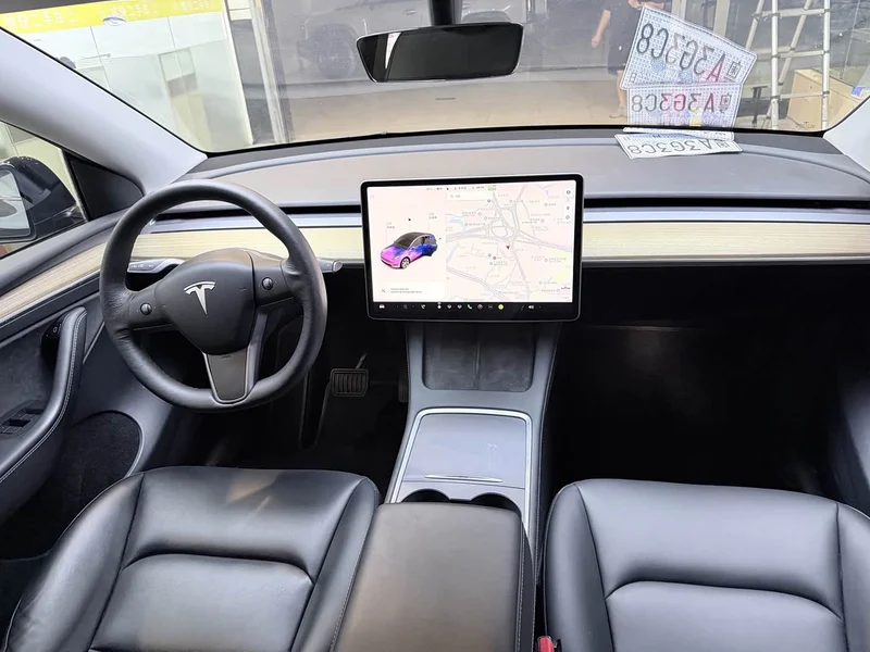 Tesla Model Y — фото 10