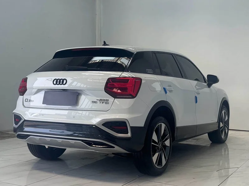 Audi Q2L — фото 6