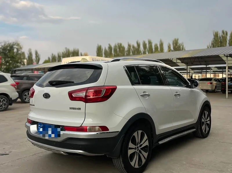 Kia Sportage — фото 8