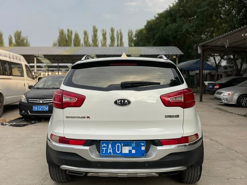 Kia Sportage — фото 9