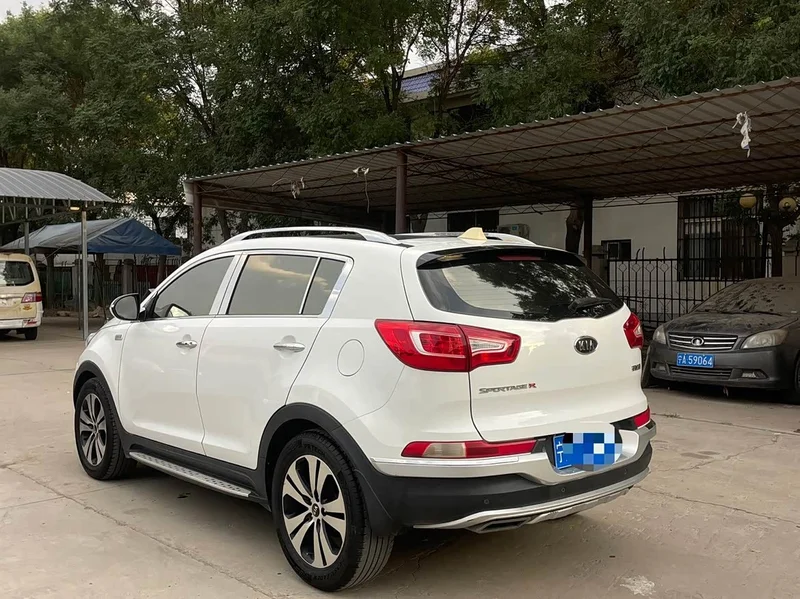 Kia Sportage — фото 10