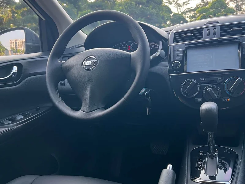 Nissan Tiida — фото 14