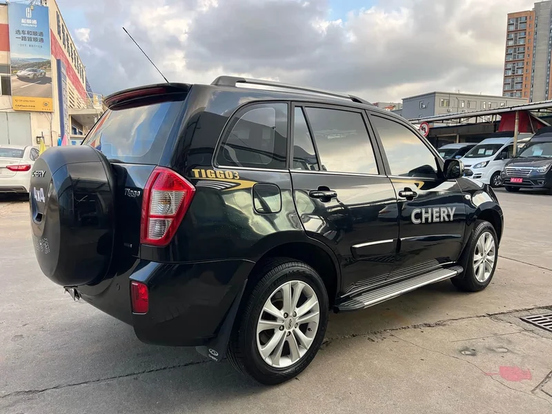 Chery Tiggo — фото 14
