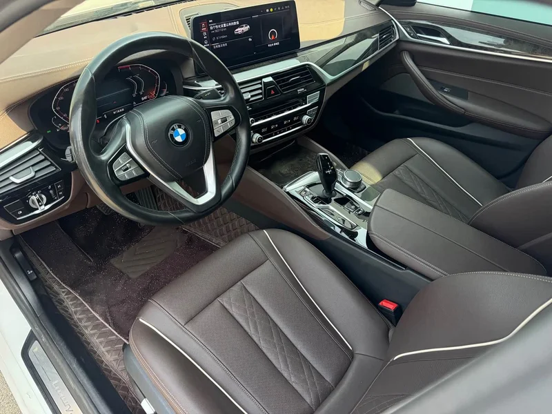 BMW 5-Series — фото 10