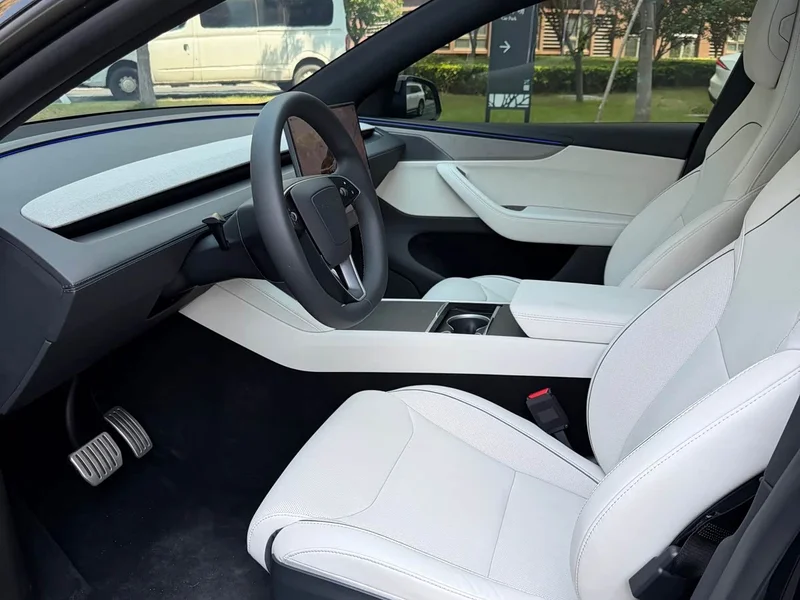 Tesla Model Y — фото 13