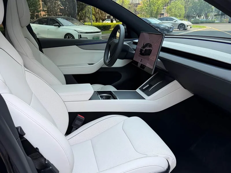 Tesla Model Y — фото 14