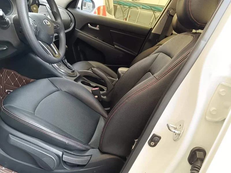 Kia Sportage — фото 11